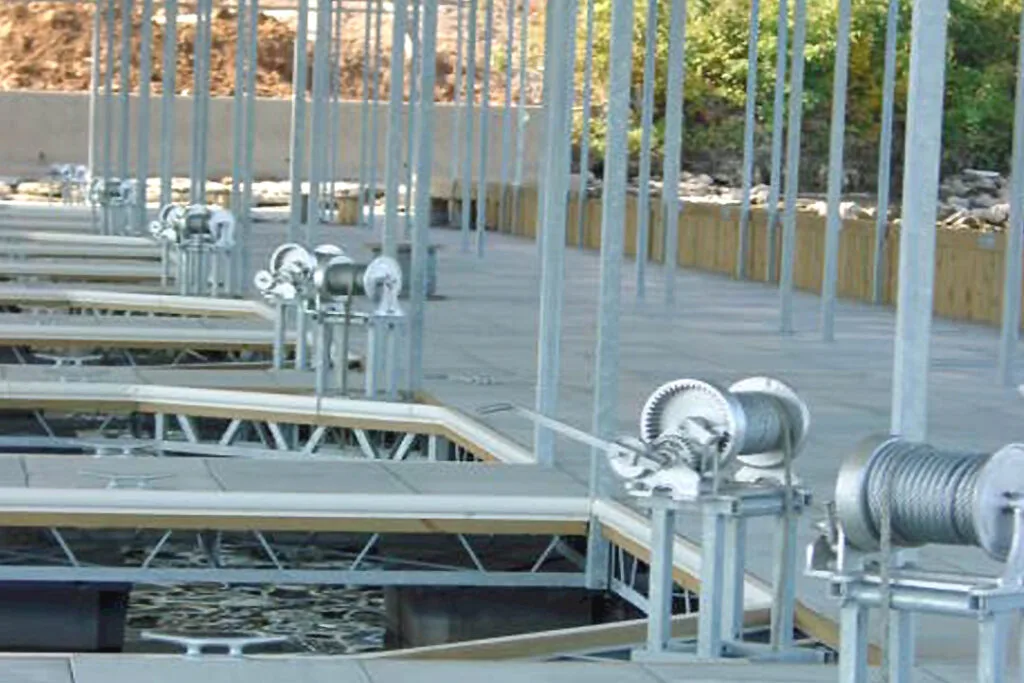 Dock Winches are used to anchor marina dock system for protection