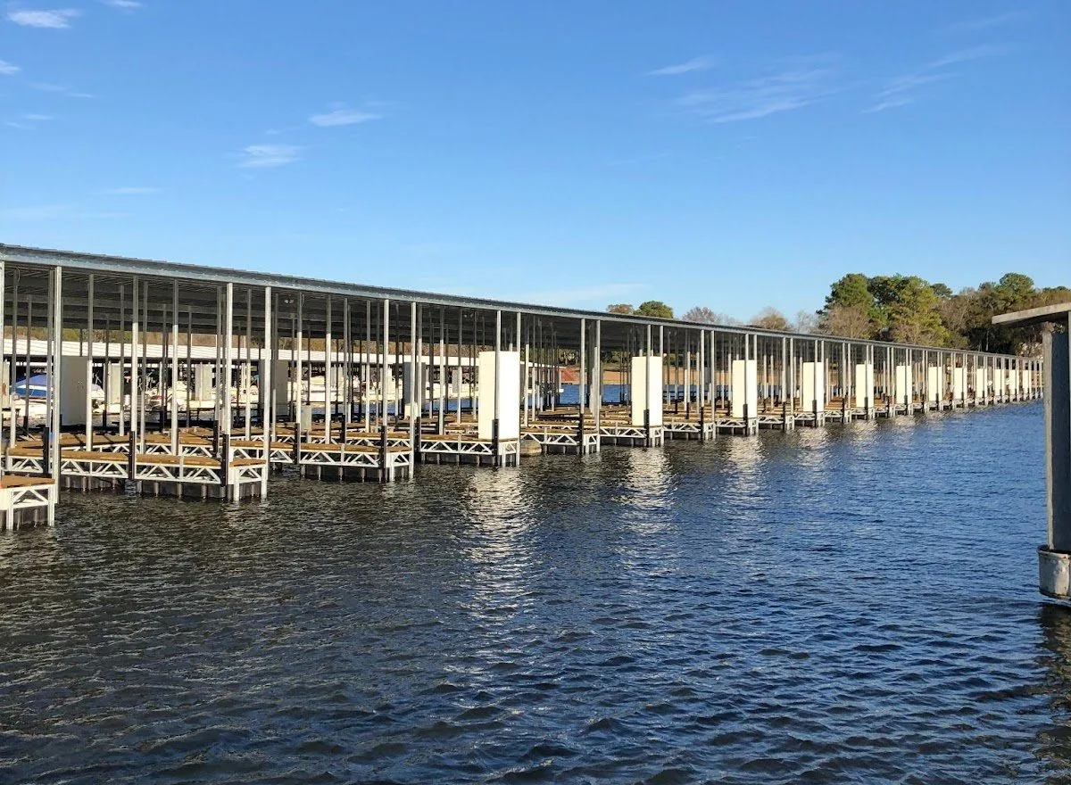 Wide angle view of a large, organized marina dock.