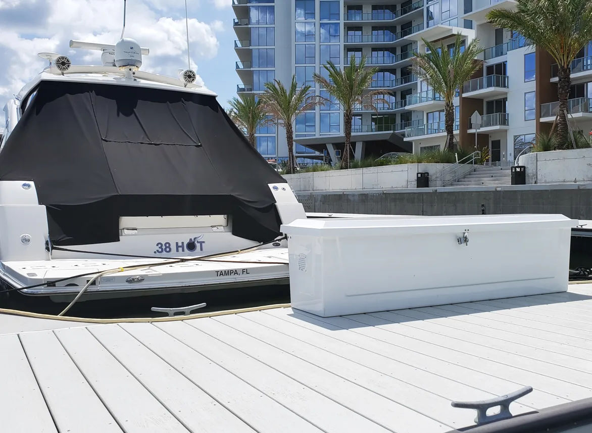 Closeup of a clean fiberglass dock storage box at a luxury marina.