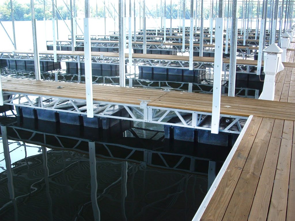 An organized dock with Dock Boxes Unlimited dock floats installed.