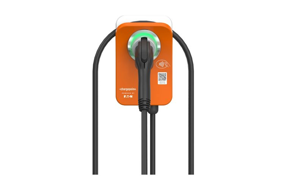 Orange electric vehicle charging station with a plugged-in connector and looped cables surrounding it